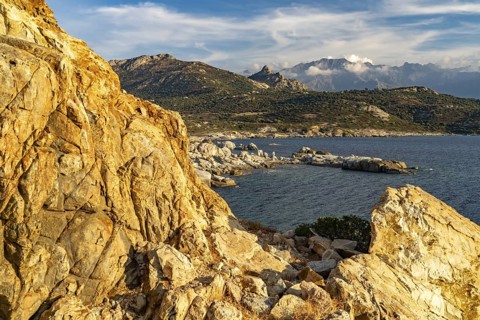 Landscape at Punta di Spanu near Lumio and the mountains, Corsica, France