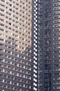 A detailed view of modern skyscrapers in Georgia, showcasing striking geometric patterns and the