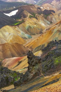 Small river between colourful rhyolite mountains, volcanic landscape, erosion landscape,