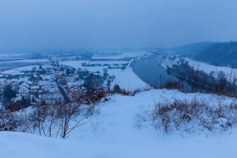 Twilight view in snow, view of Sörnewitz and the Elbe from the Bosel peak on a winter morning,