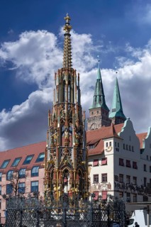 Beautiful fountain, behind the Chamber of Crafts and the towers of St Sebaldus Church, Nuremberg,