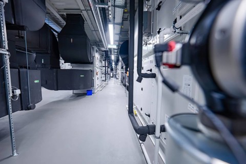 Technical view of a ventilation system, with focus on machines and blurring in the foreground,
