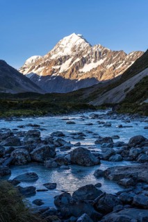 Mountainous landscape. Hooker River and Aoraki Mount Cook. evening light. Aoraki Mount Cook