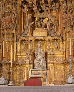 Gilded altar with Madonna figure and ornate details, Seville, Andalusia, Spain