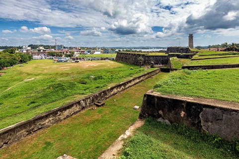 View across the fortress walls of the cityscape under cloudy sky, The Fortress of Galle in Sri