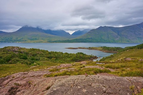 Rocky landscape with mountains and a lake under cloud cover, Loch Torridon, Kenmore, Strathcarron,