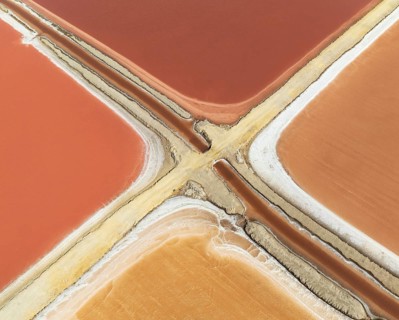 Saline ponds at the Bonanza salt works near Sanlúcar de Barrameda. The reddish colour depends on
