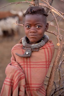Young shepherdess from the Himba people, Ombombo, Kaokoland, Kunene, Namibia