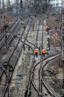 Railway employees check the tracks and switches at the Hagen-Vorhalle marshalling yard, is one of