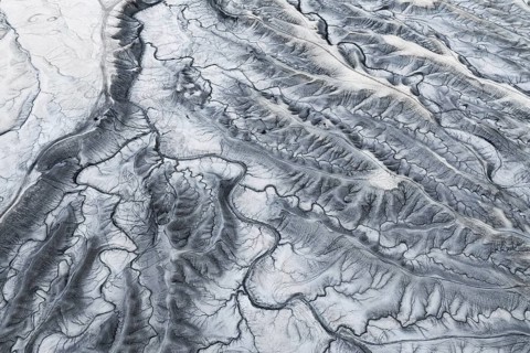 Captivating aerial image of Moonscape Overlook in Utah with a detailed view of the textured and