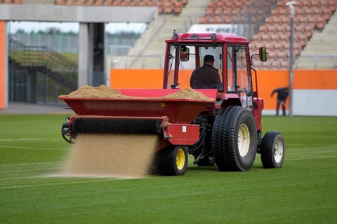 Sandblasting of football field