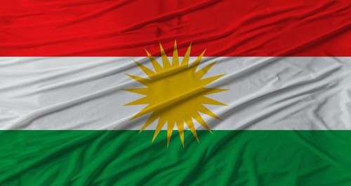 Kurdistan flag waving. Flag of Kurdistan with cloth texture