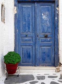 Blue front door in a white house, Naxos, Cyclades, Greece