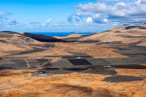 Dry volcanic landscape with fields, Lanzarote, Canary Islands, Spain