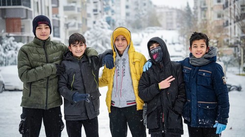 In Gaziantep, Turkey, on December 31, 2025, children and families enjoy winter activities as they