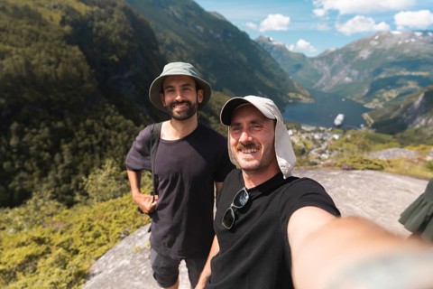 Two friends embark on a road trip through Norway's breathtaking landscapes, capturing moments of