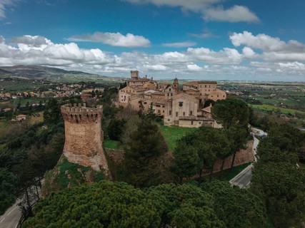 The medieval charm of Treia, Italy, captured from above. This aerial view shows the town's historic