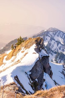 Dramatic rock peaks and snow-covered slopes rise up in an impressive mountain landscape, Hochgrat