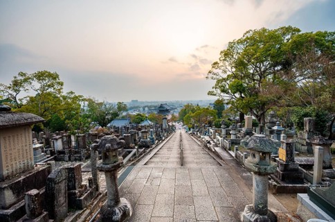 View of the city at sunset, cemetery, Konkai-Komyoji Temple, Kurodanicho, Kyoto, Japan