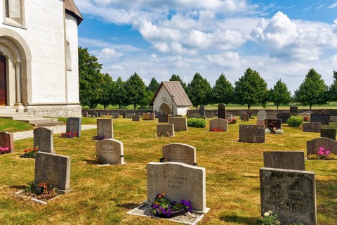 Cemetery of the medieval church of Gothem, tombstones, Gothem kyrka, east coast, island of Gotland,