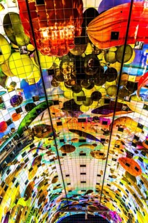 Markthal from 2014, offers over 100 food stalls and delicatessens with spectacular ceiling fresco