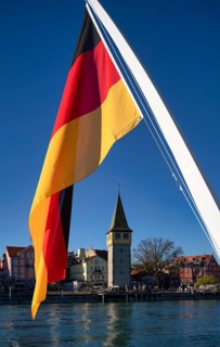 German flag, German flag, flying on ferry, behind Mangturm, Lindau, Bavaria, Lake Constance,