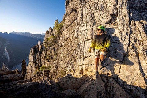 A mountaineer takes a break while practicing climbing and rappelling at Eagleâ€™s Nest in