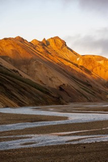 Rhyolite mountains and river Jökulgilskvísl, Landscape at Landmannalaugar, Dramatic volcanic