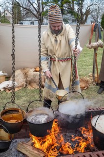 Monroe, Michigan - Workers from the Monroe County Museum demonstrate maple sugaring as it was done
