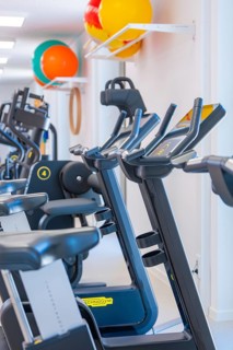 Modern treadmills in the gym with colorful balls on the walls, medical center in the new health