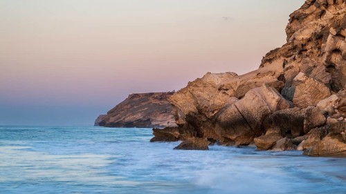 Sunrise on the coast near Mirbat, Oman