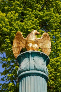 Fountain in front of the Protestant town church, green fountain with golden bird, detail, bird