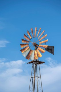 Wind turbine against a blue sky, Solitaire, Khomas region, Namibia