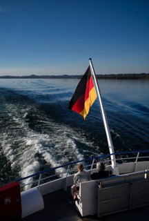 German flag, German flag, flying on ferry, passengers, behind Lindau, Bavaria, Lake Constance,