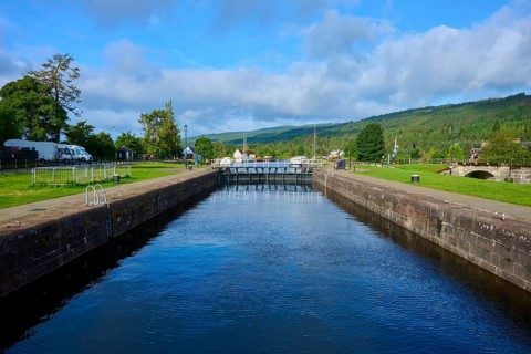 A long stretch of canal with lock in quiet rural surroundings, Caledonian Canal, Fort Augustus,