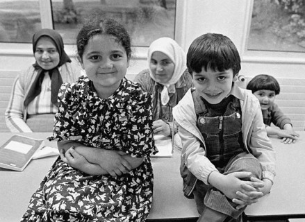 Turkish woman learn the alphabet with their children in a language course, Gelsenkirchen, Germany