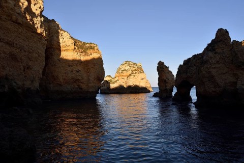 Rocky coast in evening light, Ponta da Piedade, Lagos, Algarve, Portugal