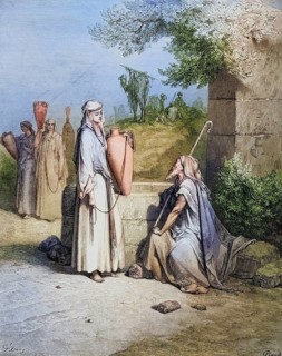 Engraving from the Dore Bible illustrating Genesis, Eliezer and Rebekah by Gustave Dore 1832-1883