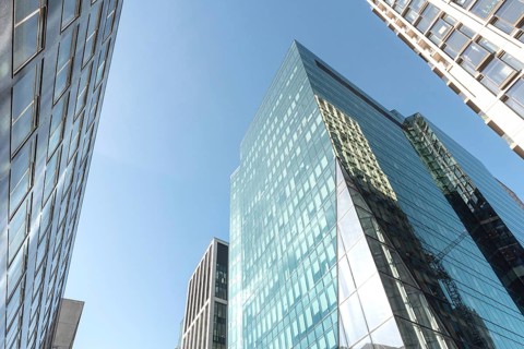 Modern high rise glass fronted British architecture, a business district on the south bank of the