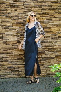 Summer fashionable woman In spaghetti strap long dress and shirt