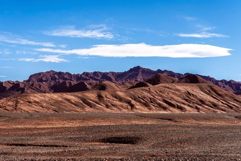 Panoramic view of the vibrant and rugged terrain of the Devil's Desert (Desierto del Diablo) in