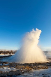 Strokkur, Gysir erupting, snow, winter, Haukadalur Valley, Golden Circle, Iceland, Scandinavia