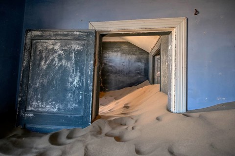 Former dwelling house full of sand, Kolmanskop, restricted diamond area, Karas region, Namibia