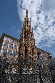 The 19 metre high Schöne Brunnen fountain on the Hauptmarkt is a copy made of shell limestone in