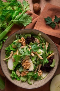 Fresh, Waldorf salad, celery stalk with chicken, apple and walnut, grapes, herbs, homemade, no