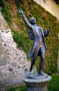 Statue of the poet Taugenichts, city wall, old town, Wangen im Allgäu, Bavaria, Germany