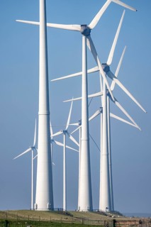 Wind farm in the north of the Netherlands, near Eemshaven, energy center, in addition to wind