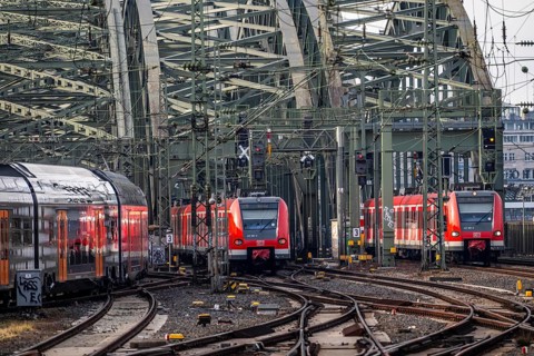 Rail system in front of Cologne Central Station, Hohenzollern Bridge across the Rhine, RRX,