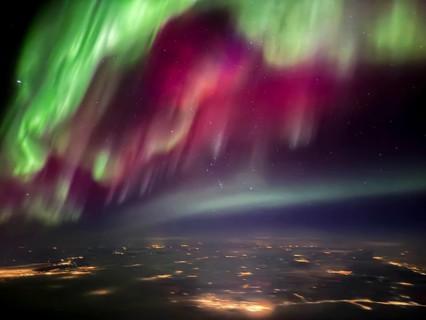 Northern lights, aurora borealis, aerial view from an airplane, Finland