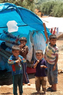 Atmeh Refugee Camp, Idlib, Syria. June 17th 2013. Internally displaced child Syrian refugees in the